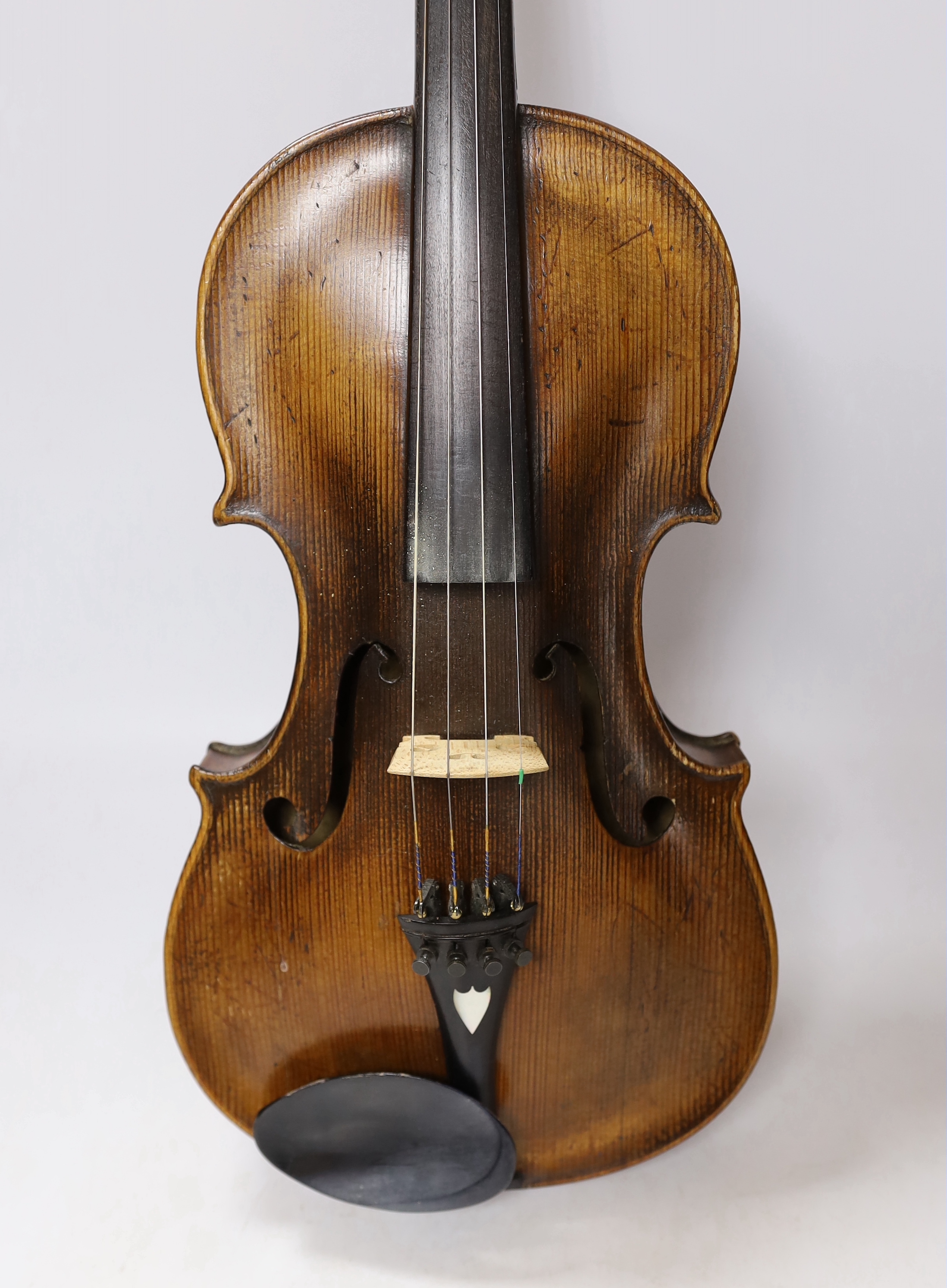 An early 20th century English violin stamped Norman Duke, London, one piece back with wax seal, cased, violin 60cm long